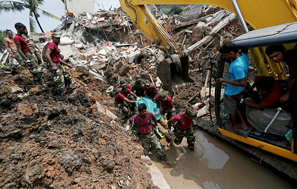 Hope fades for missing in Sri Lanka; anger grows as garbage toll hits 23