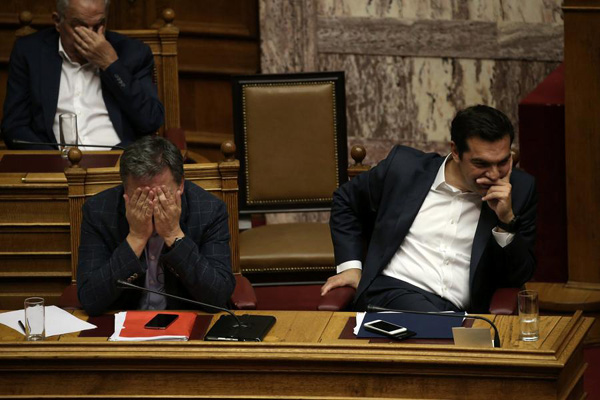 Greek parliament ratifies austerity bill ahead of Eurogroup meeting