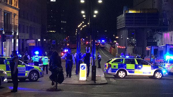 Armed London police searching for suspects after new attack