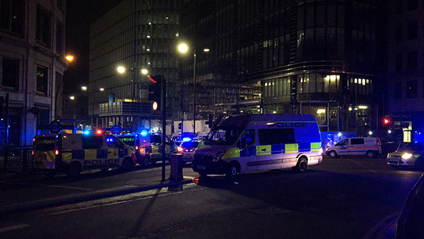 Armed London police searching for suspects after new attack