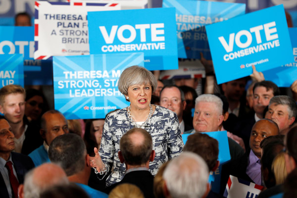 Polls on eve of UK election suggest PM May will boost majority
