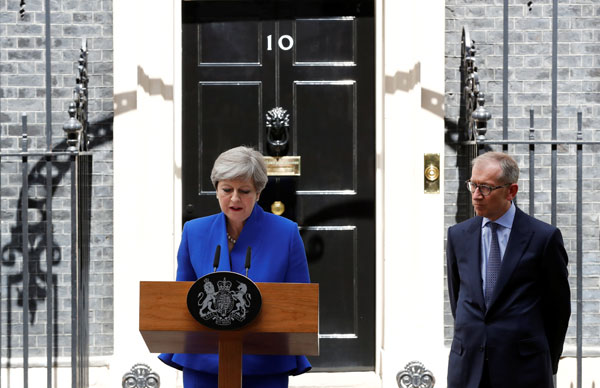 May's deal to work with DUP causes anger among political rivals
