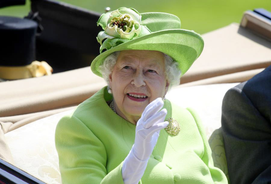 Despite high temps, Royal Ascot-goers don finest outfits