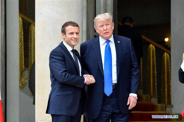 Macron expects Trump to come back to Paris accord, perhaps in 'coming months'