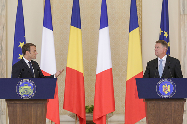 Macron confident of 'posted' workers deal after meeting Romanian president