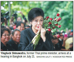 Thai court issues arrest warrant against Yingluck