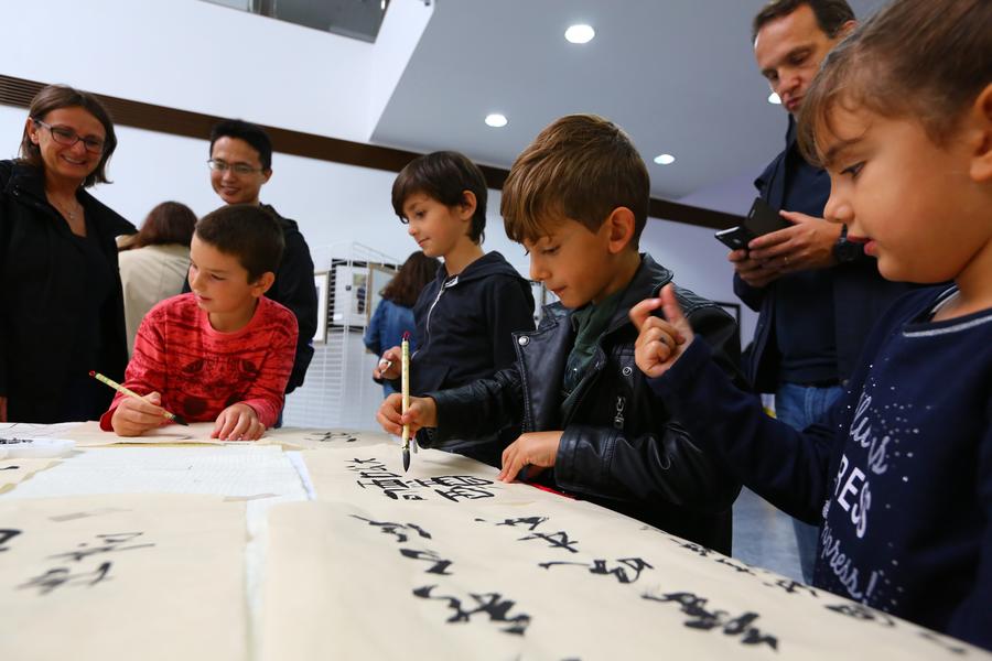 Performers show on Chinese open house day in Brussels