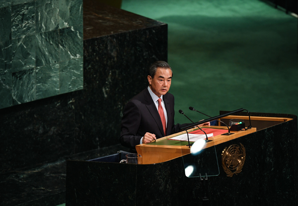 Wang says China always sides with peace