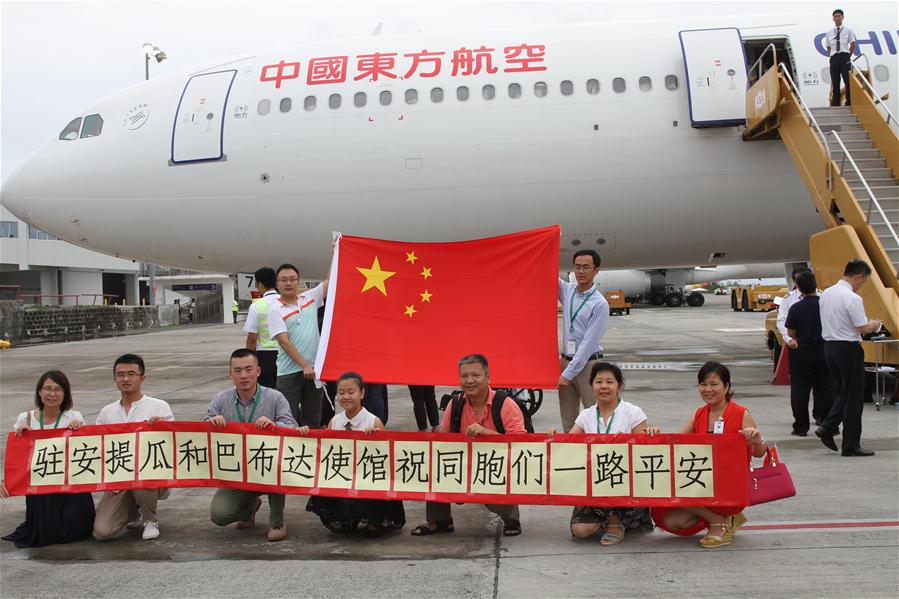 Chinese head home after hurricane