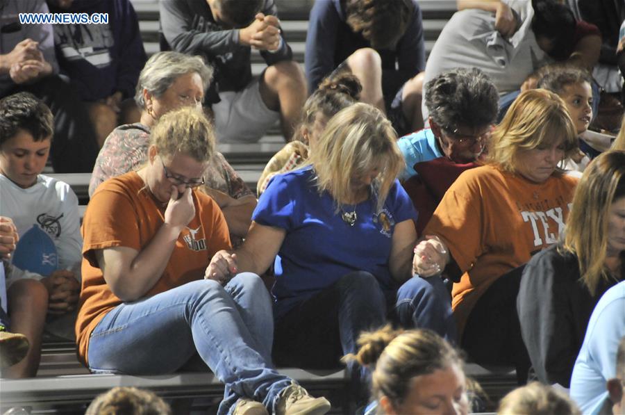 People mourn victims of mass shooting in Texas