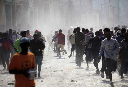 Haitian capital sees riots for goods