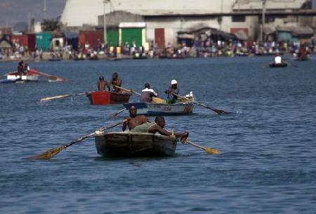 Haitians flee homeland by boat as in movie '2012'