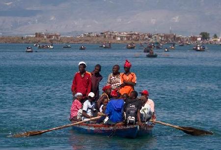 Haitians flee homeland by boat as in movie '2012'