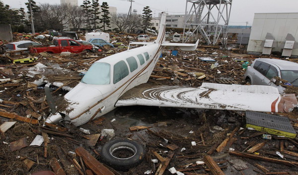 Japan's quake causes huge losses, rescues mobilized