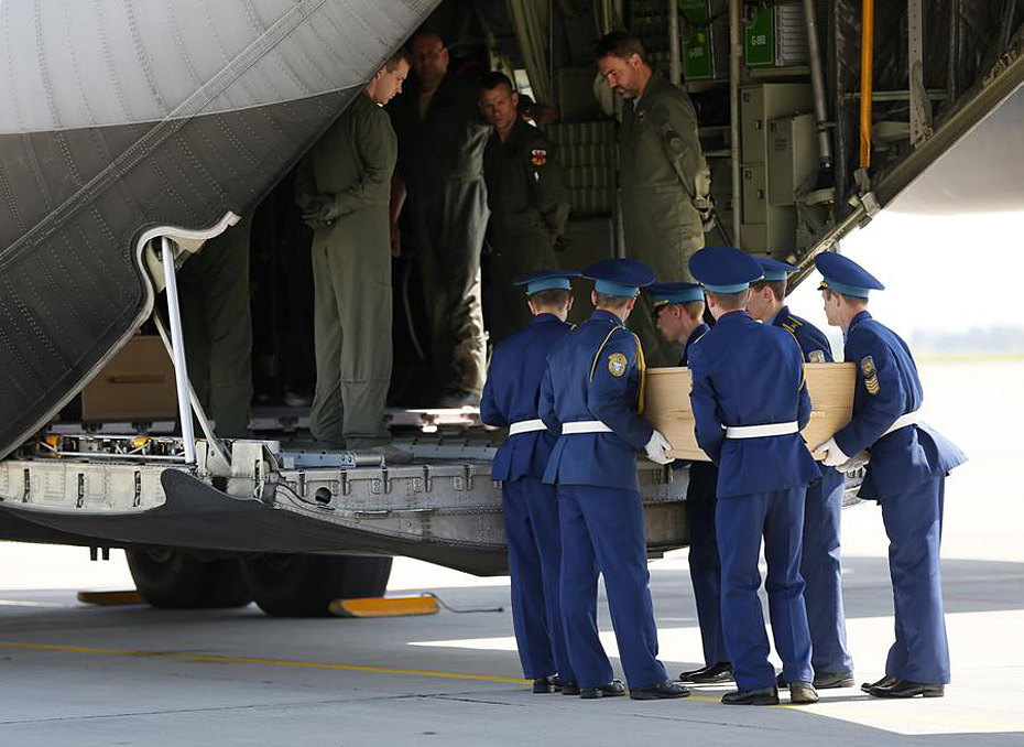Plane with MH17 bodies en route to Netherlands