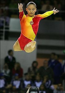 Gymnast Zhang Nan of China performs her routine on the beam during the women's team final at the 39th Artistic Gymnastics World Championships in Aarhus, Denmark. China won the title ahead of the US and Russia