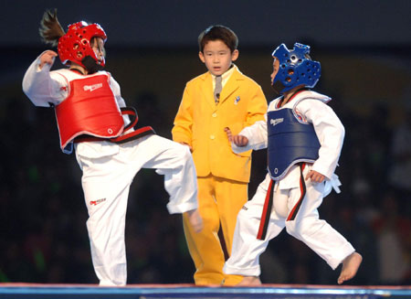 Olympic champs herald China glory in taekwondo worlds