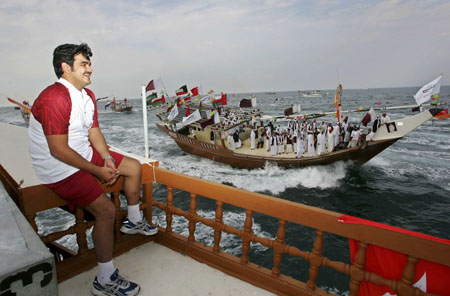 Asian Games torch backs in Qatar