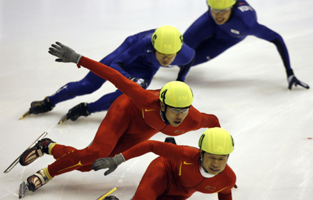 Hu takes gold while Olympic champion Ahn fouls Li