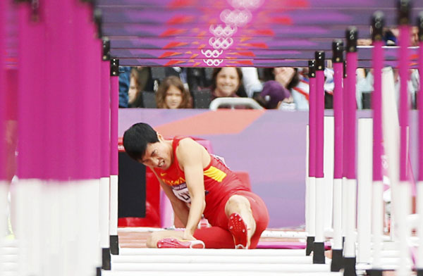 Liu out of 110 hurdles, fans and rivals show respect