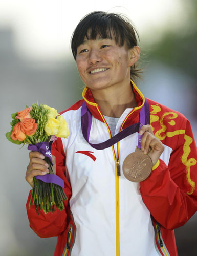China cheers for 1st Tibetan Olympic medalist