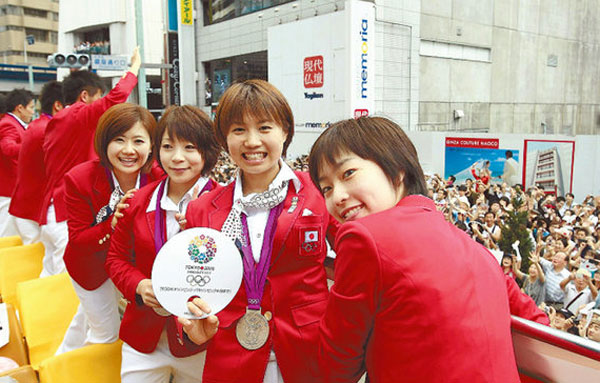 First Olympic parade brings Tokyo to standstill