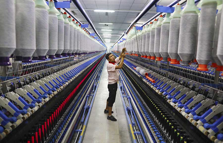 Xinjiang's cotton town transforms into textile hub