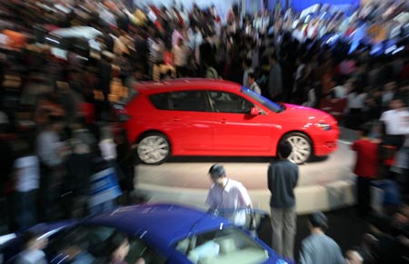 Record numbers crowd into city auto show