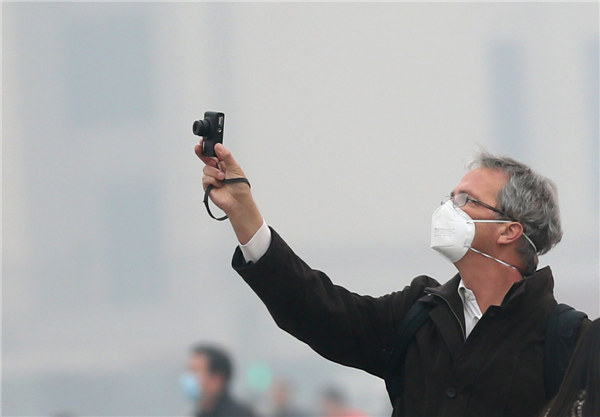Beijing lifts heavy air pollution alert