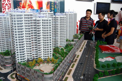 China cuts taxes, rates to boost housing market
