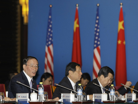 Wang: China, US should work together in financial storm