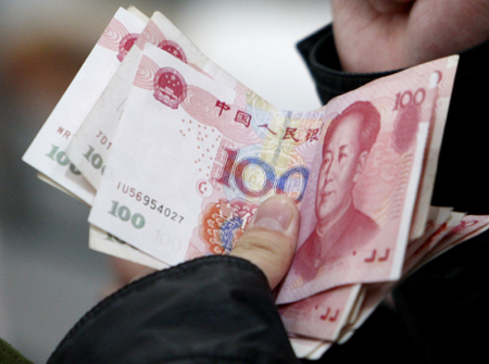 China to begin yuan-settlement trials