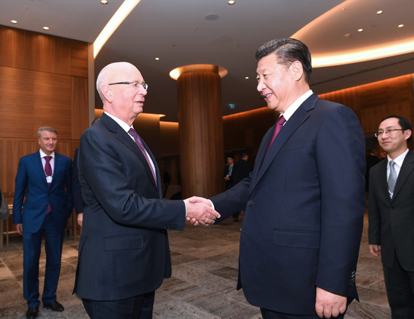 China's Xi, WEF founder agree on a way forward for the global economy