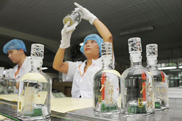 Losses hang over top liquor firms in tough first quarter