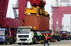 Qingdao Port shares tumble on debut in HK