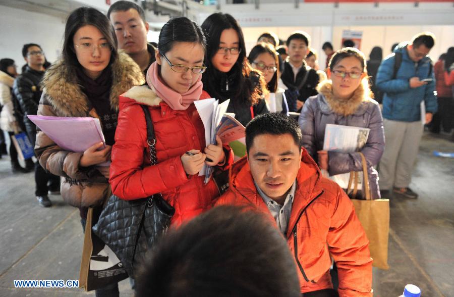 Job seekers attend job fair for postgraduates in Beijing