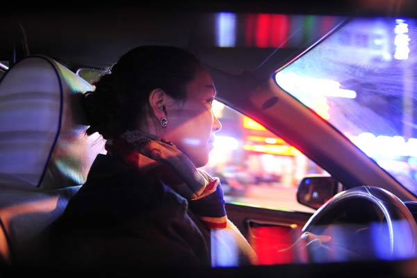 Woman taxi driver doing the rounds in Fuzhou