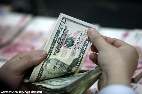 China's forex reserves post biggest monthly drop on record