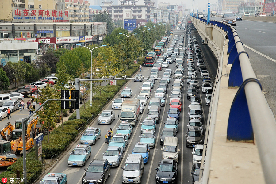 Traffic grinds throughout China for National Day holiday