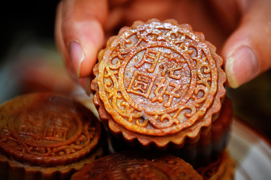 Gold and silver mooncakes look more alluring than real ones