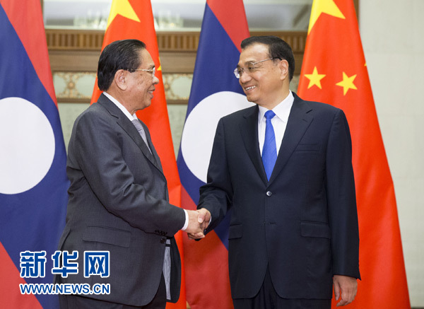 China pledges to advance ties with Laos