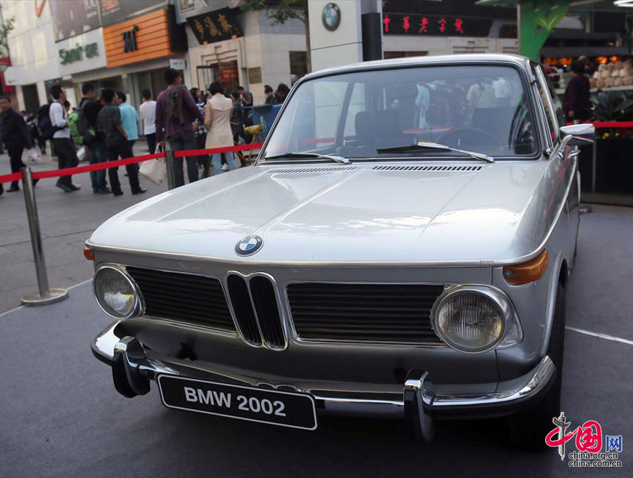 Vintage cars gather in downtown Beijing