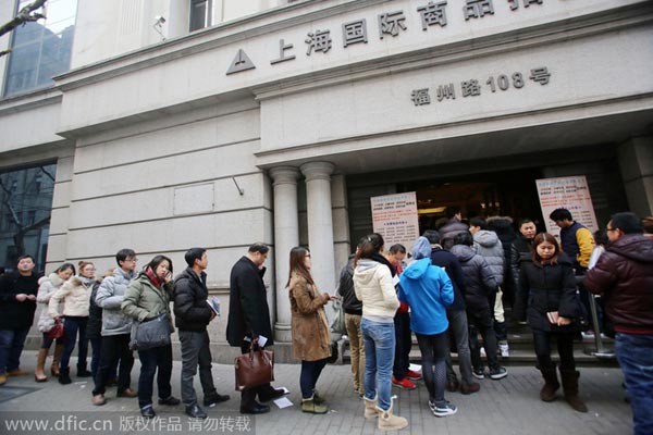 People line up for license plates in Shanghai