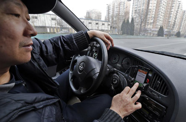 Shanghai government cracks down on taxi booking apps