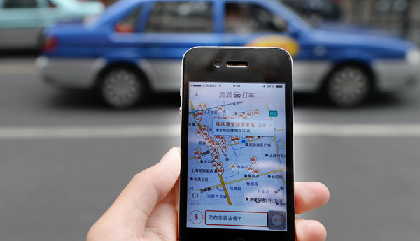 Didi Kuadi taxi service violates regulations, Beijing authorities say