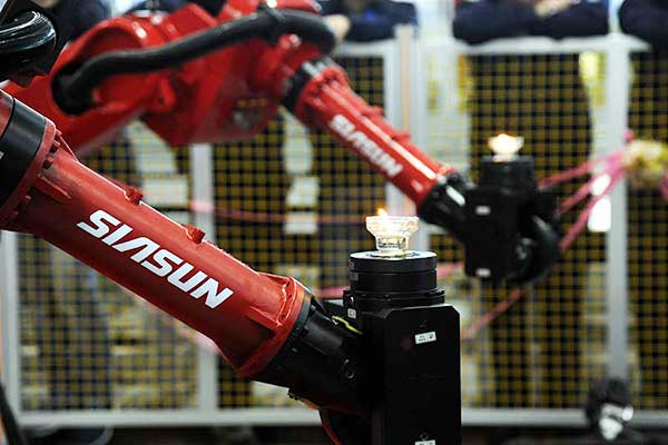Battle of the machines: Chinese robot makers take on foreign peers
