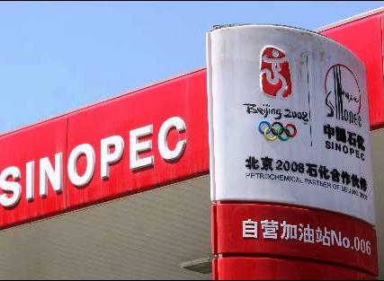 Sinopec says Q1 profit down by over half