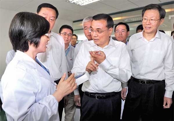 Expand domestic market demand: Li