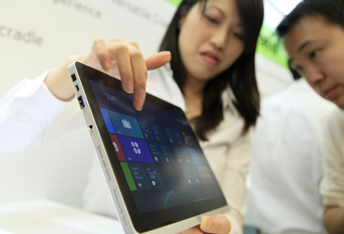 Tablet, phone markets lure PC makers