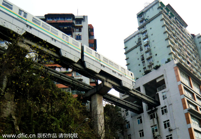 Light rail pass through building in Chongqing